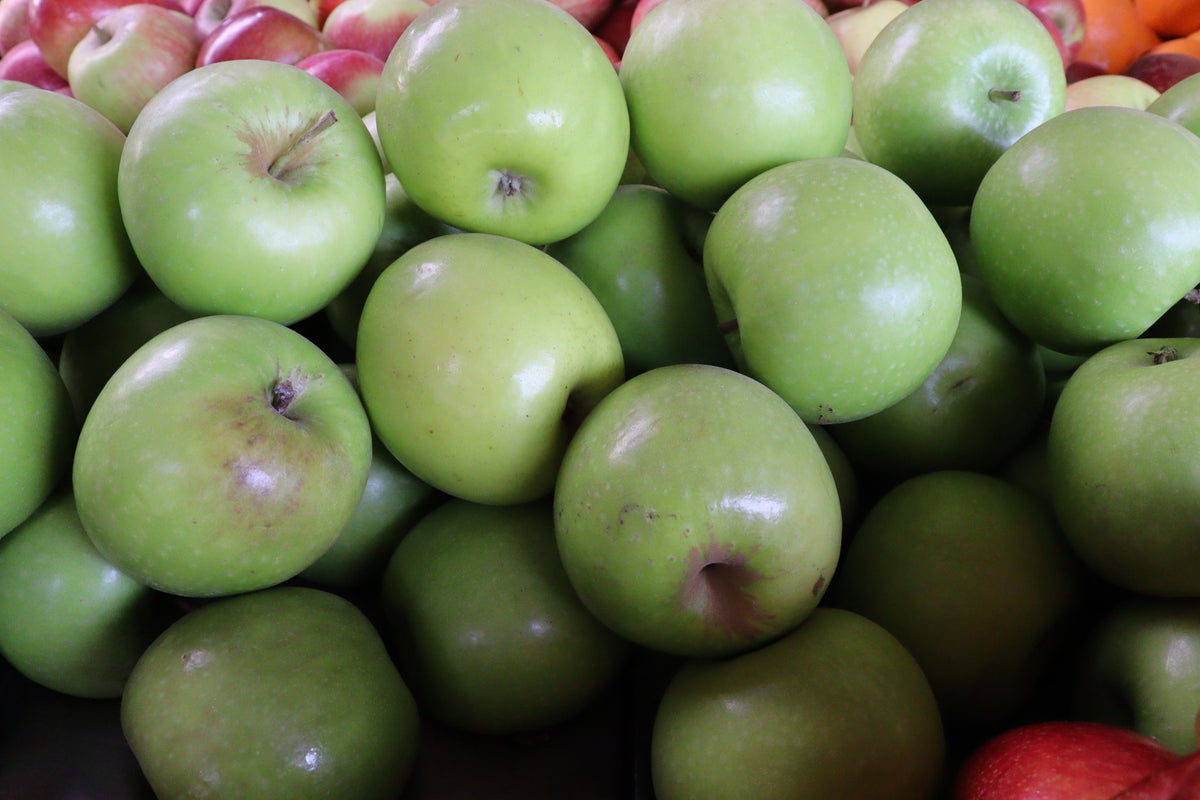 Representative apples fruit stock photo, not verified as Red Delicious Apple or actual nursery specimen